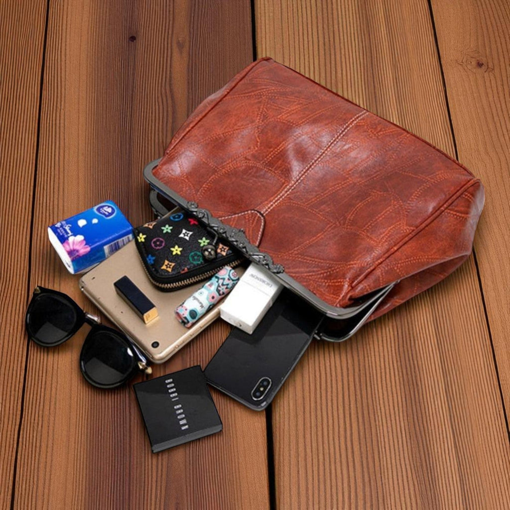 Borsa vintage con chiusura a scatto