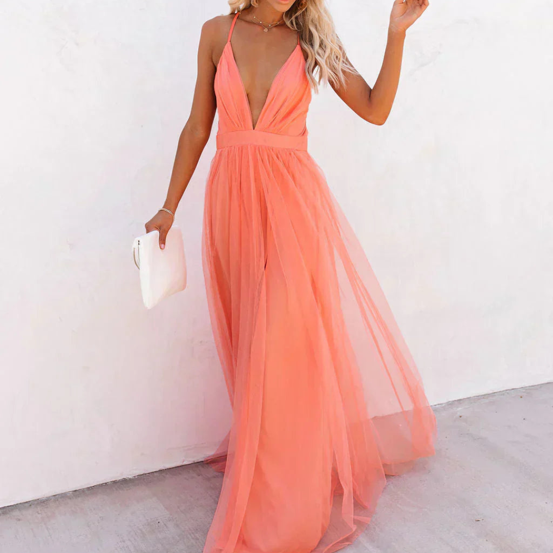 "La Chispa | Vestido Maxi Luz Coral" can be translated into Spanish from Spain as:

"La Chispa | Vestido Maxi Luz Coral" (The title is already in Spanish and does not require translation.) 

If you meant to ask for a different style or variation of the ti