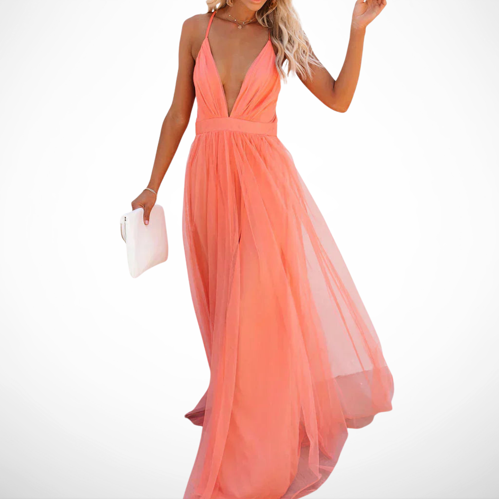 "La Chispa | Vestido Maxi Luz Coral" can be translated into Spanish from Spain as:

"La Chispa | Vestido Maxi Luz Coral" (The title is already in Spanish and does not require translation.) 

If you meant to ask for a different style or variation of the ti