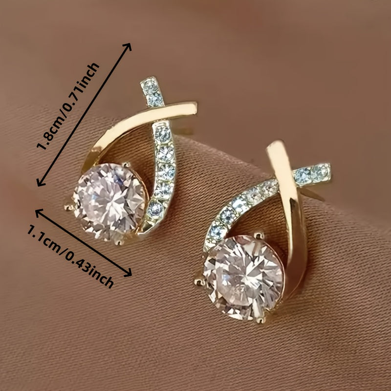 Pendientes de botón con cruz dorada y circonitas