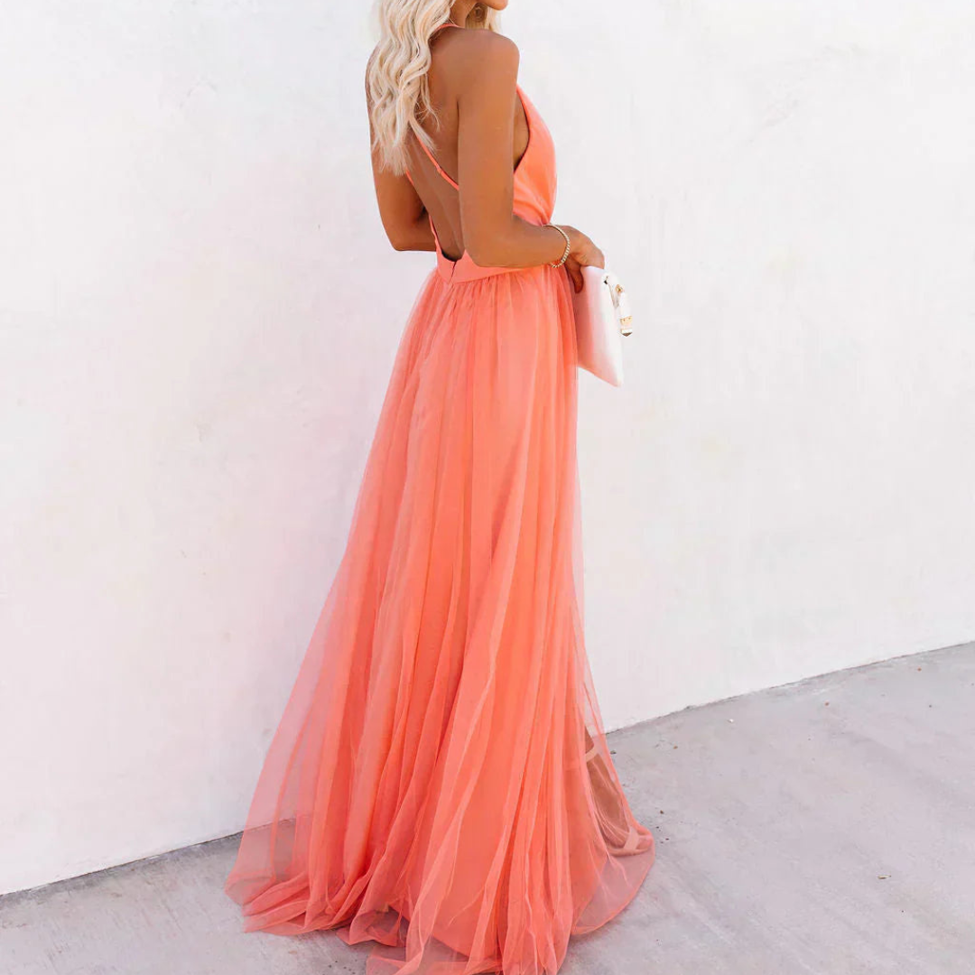 "La Chispa | Vestido Maxi Luz Coral" can be translated into Spanish from Spain as:

"La Chispa | Vestido Maxi Luz Coral" (The title is already in Spanish and does not require translation.) 

If you meant to ask for a different style or variation of the ti