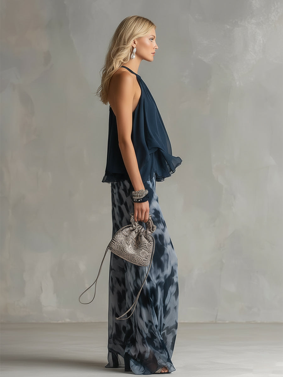 Ludovica - elegante vestido de gasa con corpiño de cuello alto y pantalón ancho estampado.