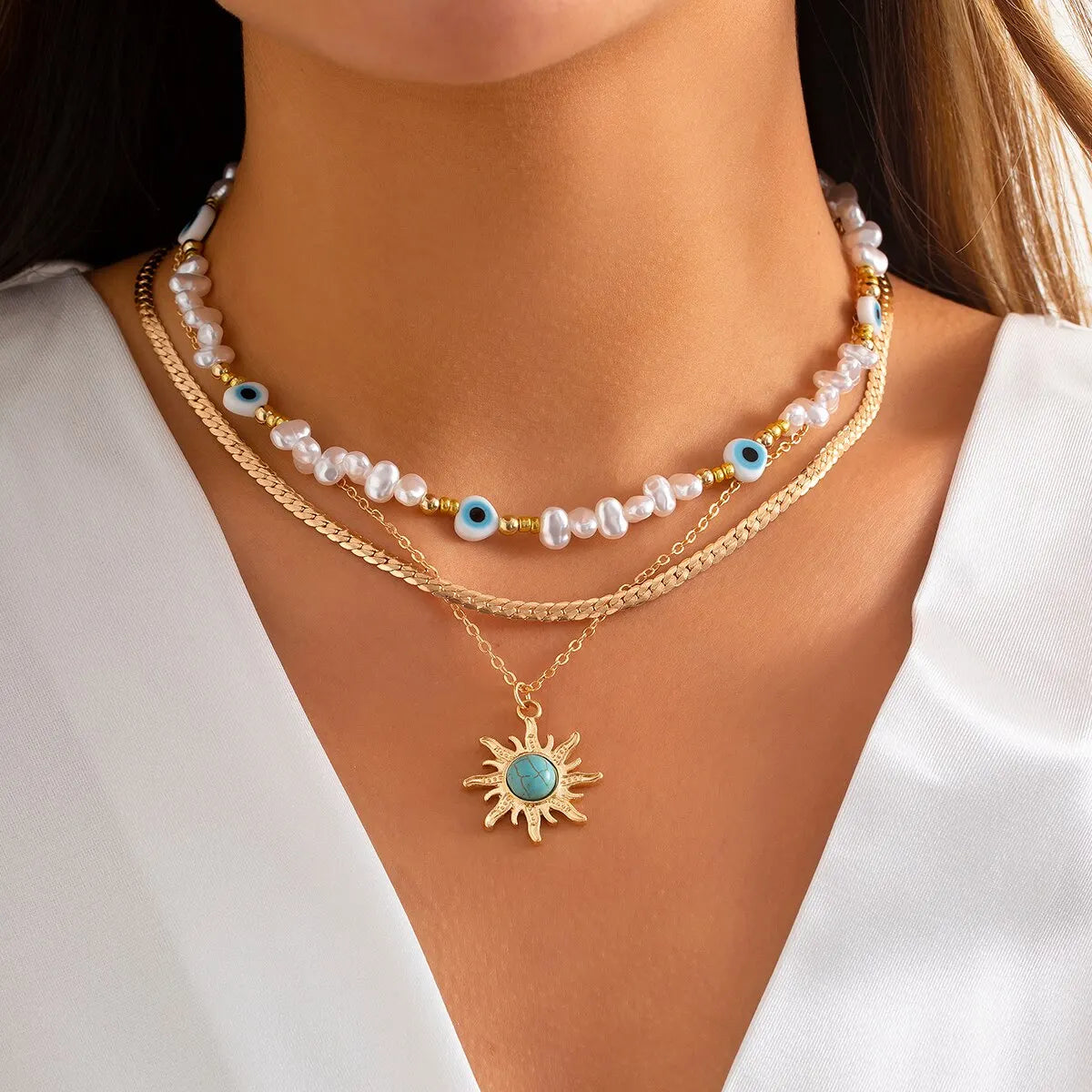Conjunto de collares superpuestos Parel y Ojo Turco – Colgante de sol estilo bohemio