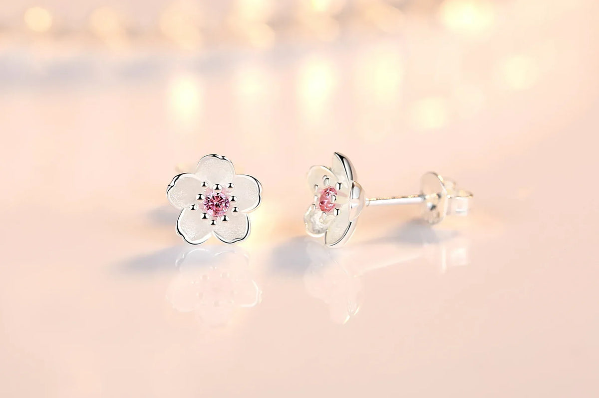 Pendientes de botón en forma de flor con zirconitas