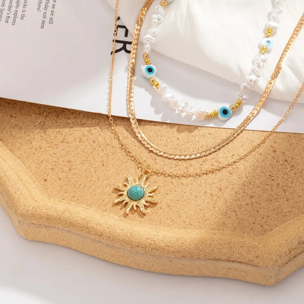 Conjunto de collares superpuestos Parel y Ojo Turco – Colgante de sol estilo bohemio