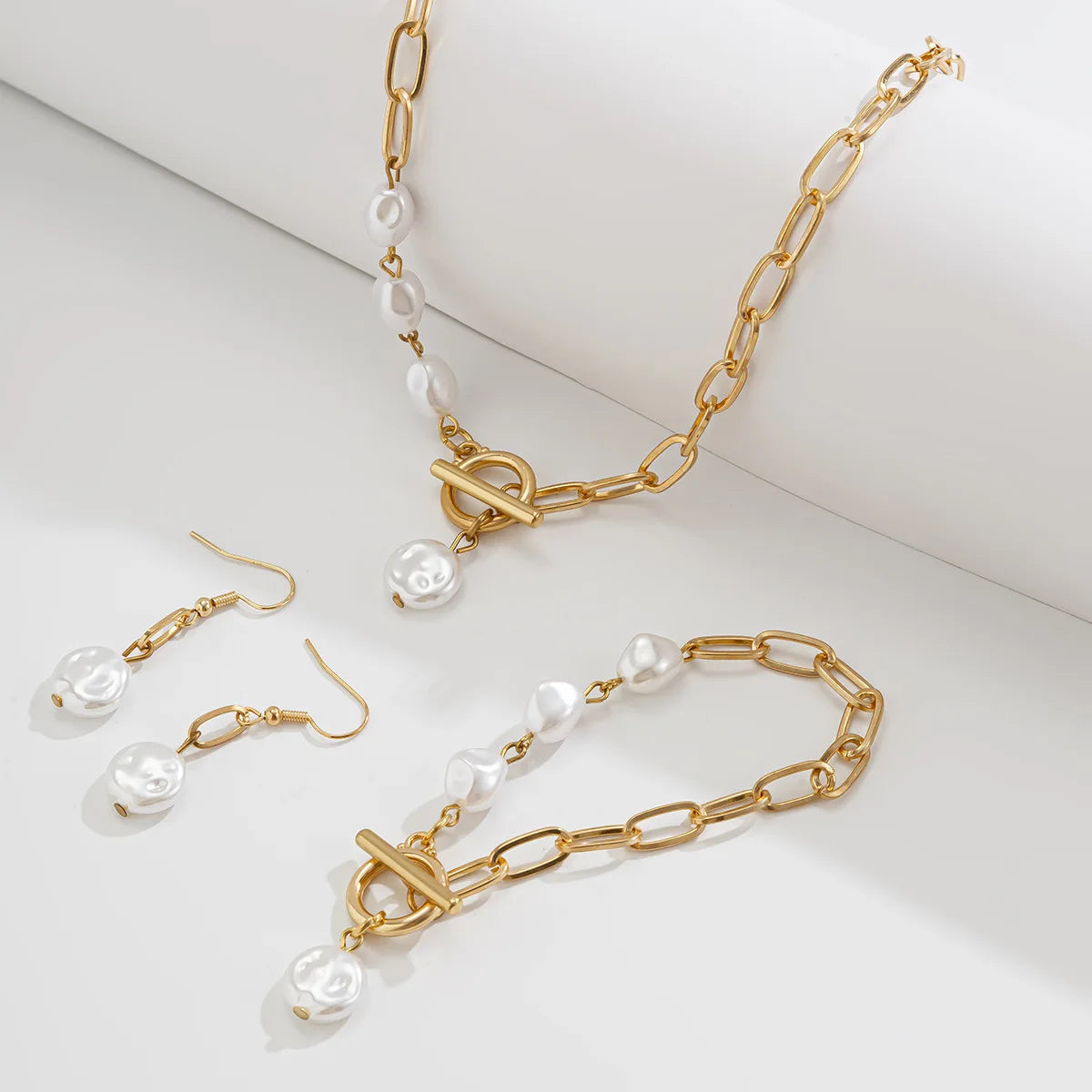 Set di Collana, Bracciale e Orecchini in Perle Paperclip Eleganti