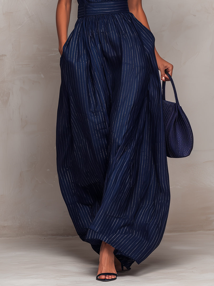 Anna - Tuta blu scuro a righe con scollo a chiave e pantaloni a gamba larga