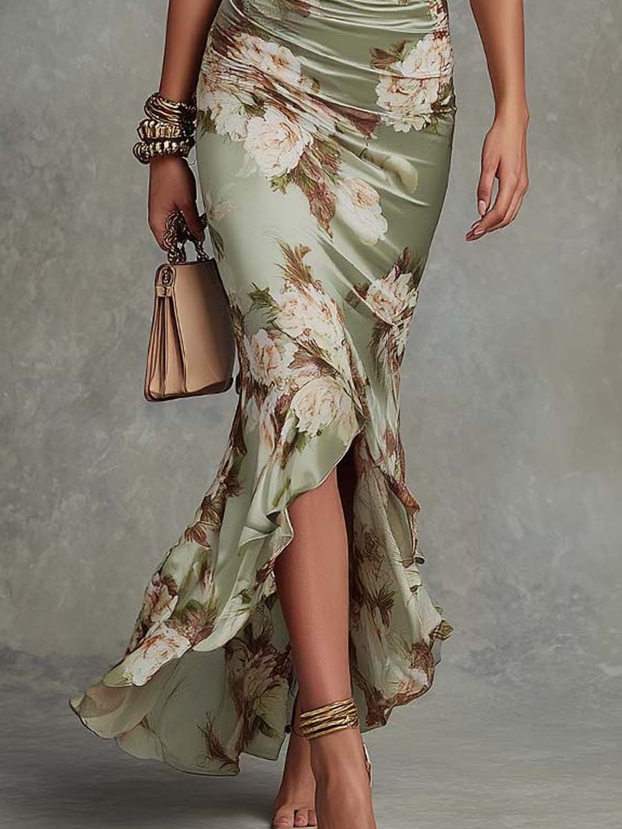 Anna - Abito lungo asimmetrico in satin verde con scollo a V, maniche a campana arricciate e motivo floreale