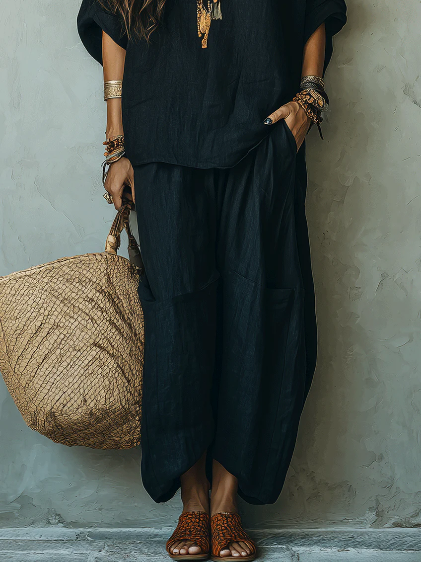 Top Nero Off-shoulder e Pantaloni Ampi Loose Suit