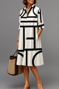Ellie | Vestito midi curato e stiloso