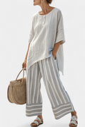 Talvora | Elegante Blusa Asimmetrica e Pantaloni a Righe
