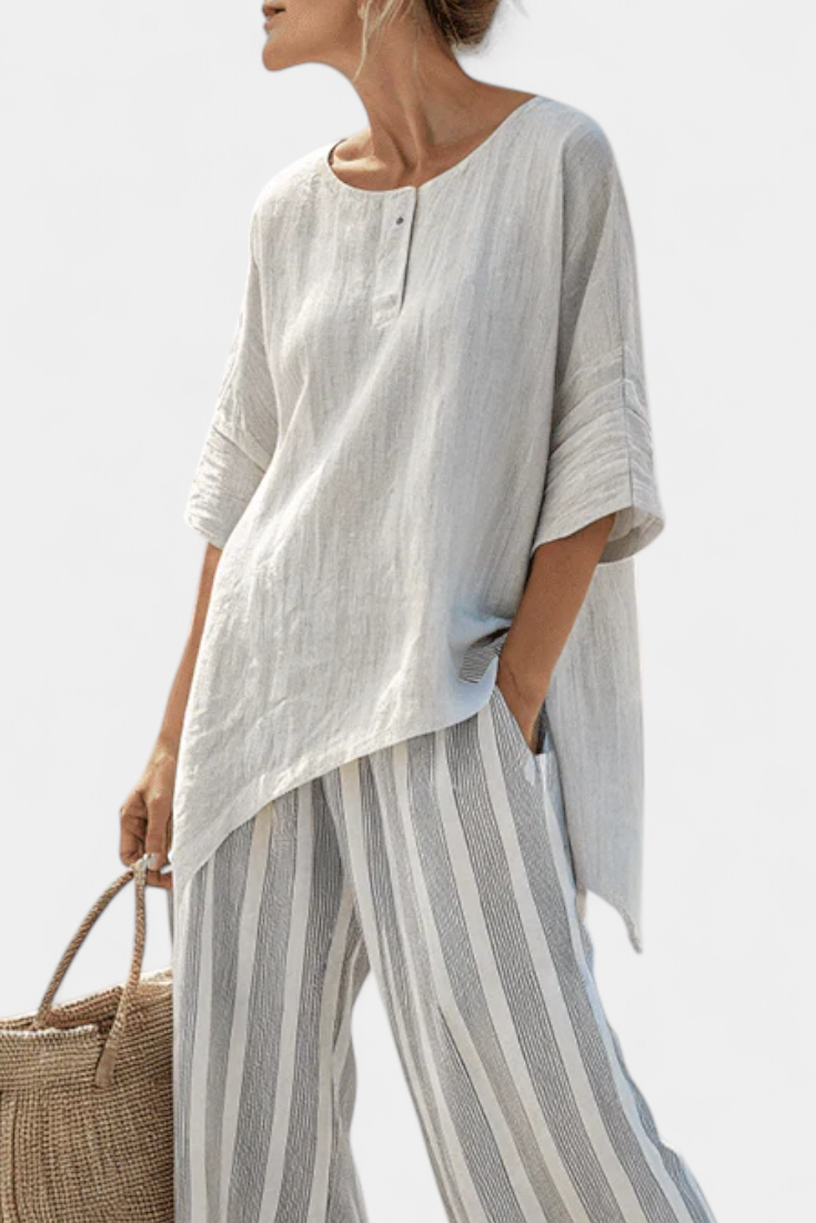 Talvora | Elegante Blusa Asimmetrica e Pantaloni a Righe