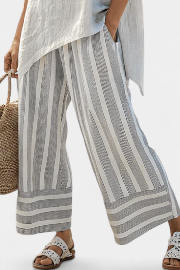 Talvora | Elegante Blusa Asimmetrica e Pantaloni a Righe