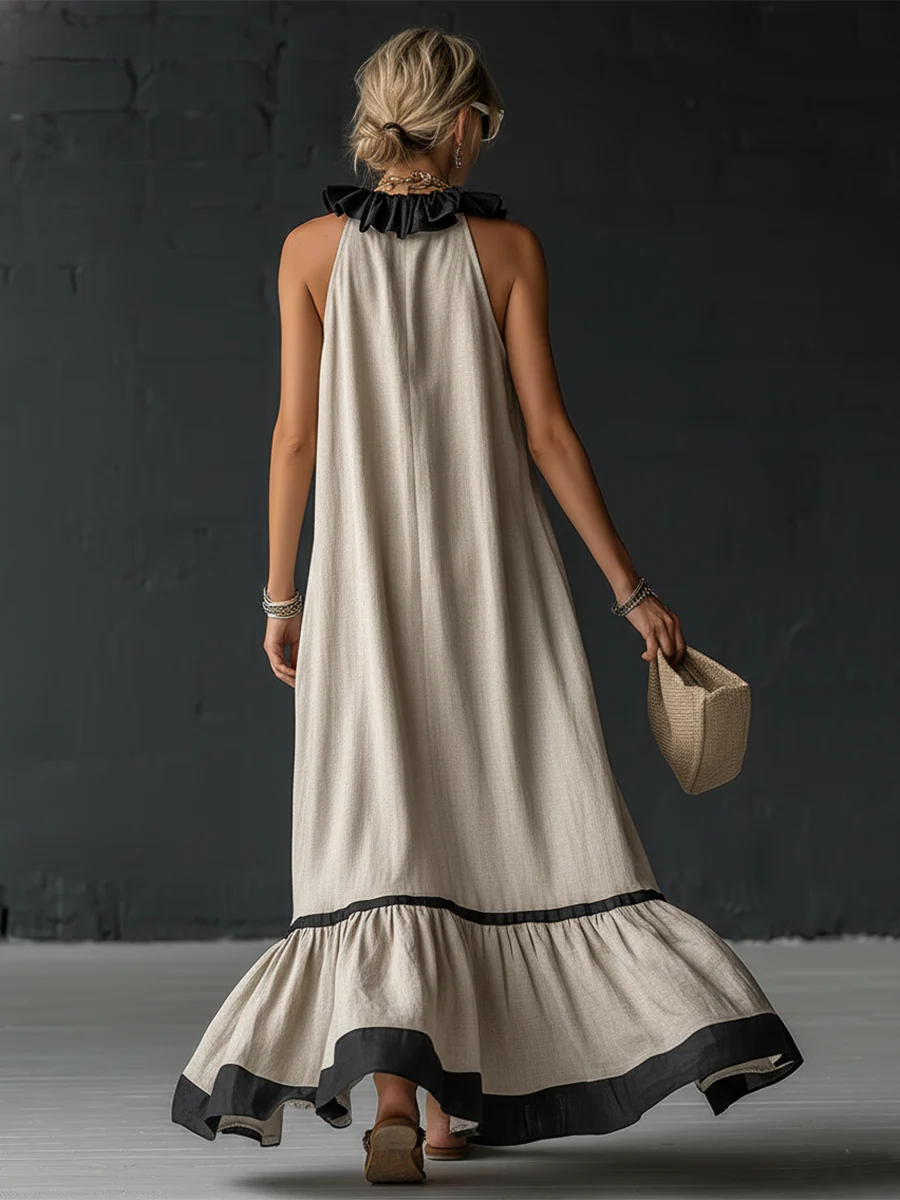 Vestito maxi elegante e romantico con volant e blocchi di colore
